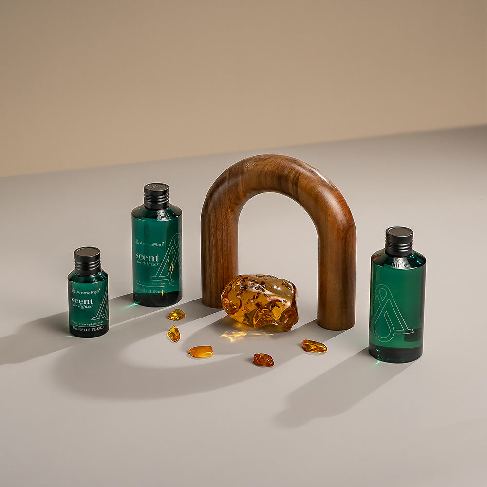 A beautifully designed diffuser in a rich, dark color with intricate details, placed on a stylish modern surface with a backdrop evoking a luxurious atmosphere.
